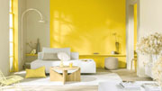 a room decorated in yellow